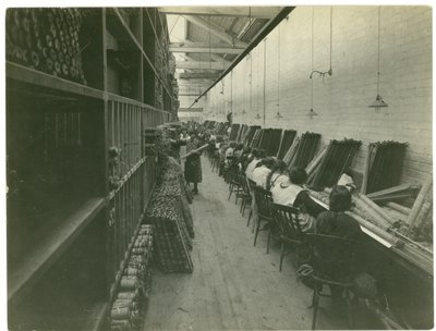 Axminster threading, carpet factory, 1923 by English Photographer